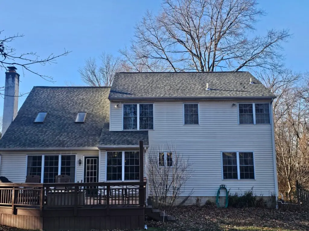 Asphalt shingle roof replacement, rear view of suburban home — Discounted Roofing LLC Philadelphia